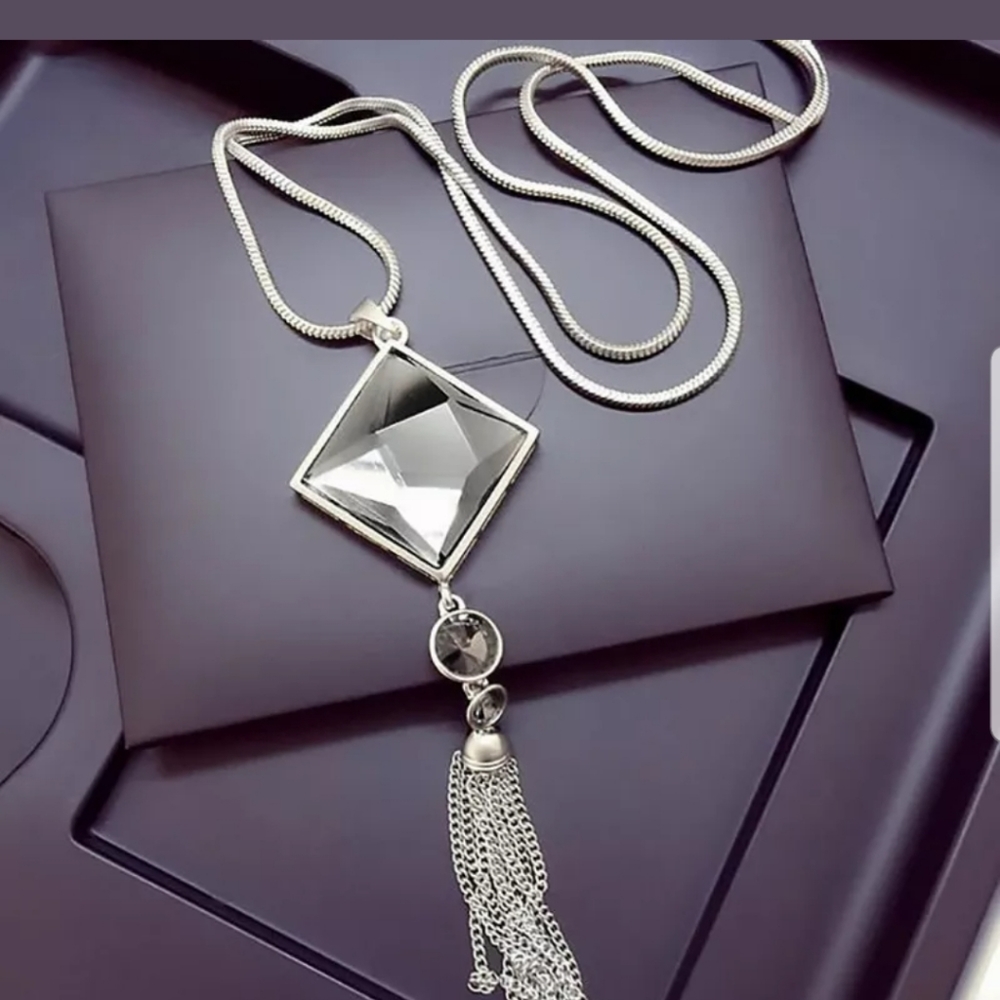 Big crystal pendant with long silver chain